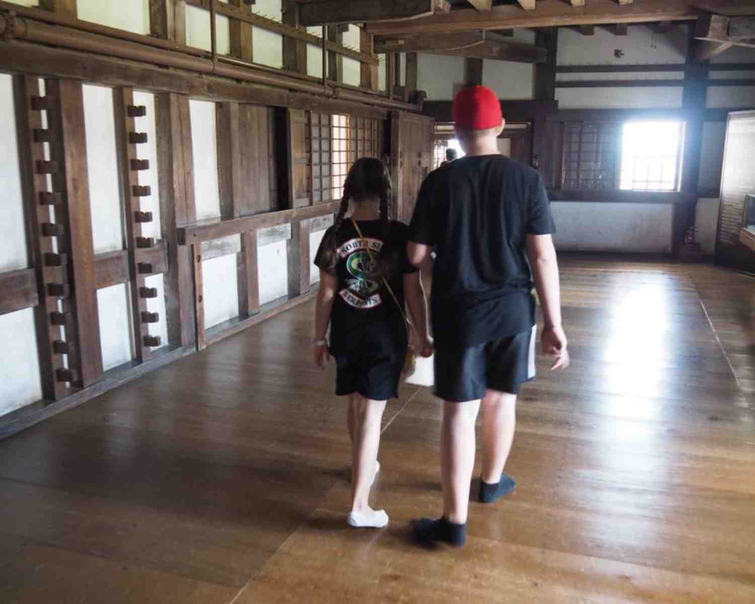 The kids exploring Himeji Castle in Japan